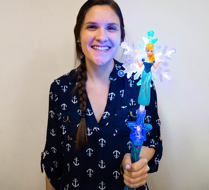 Girl Holding Blue Princess Wand