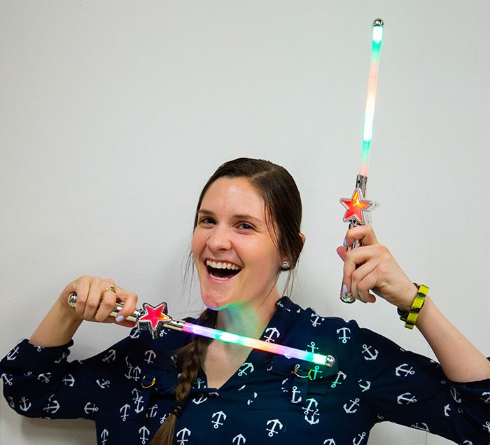 Girl holding two Star Wands