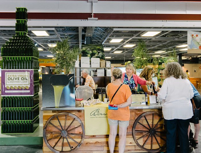 Guests looking at an Olive Oil Display