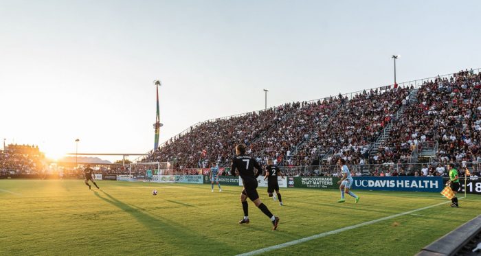 Sac Republic FC on the field at Heart Health Park with a full audience