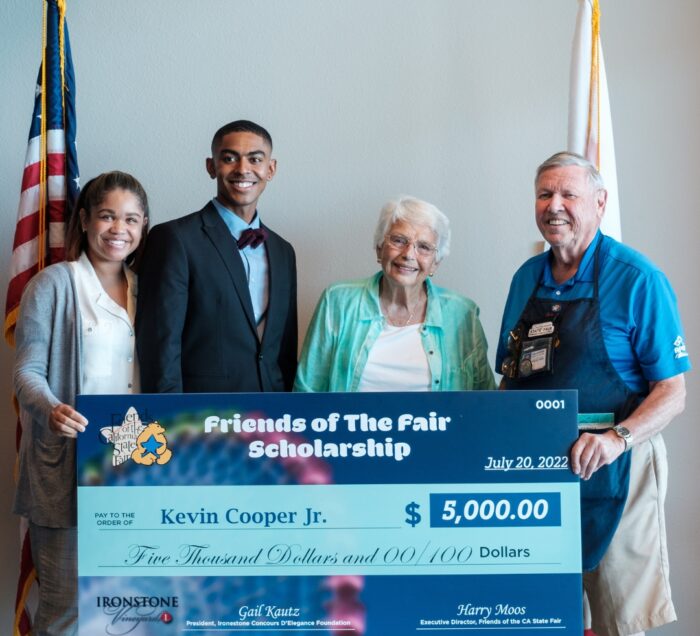 Kevin Cooper Jr. being presented a scholarship grant check from Friends of the California state fair